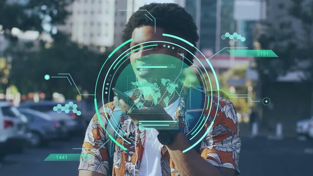 Adult man speaking into phone, activating HUD showing world map and chart, demonstrating technology
