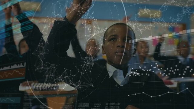 Front-row boy raising hand, speaking in education, answering offframe prompt, data overlay hovering