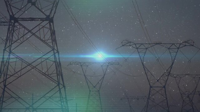 Pylons framing sky, center light rising, growing into flare peaking, fading, showing flare streaks