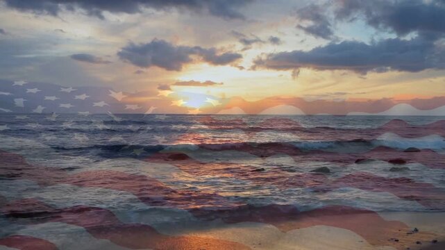 Sun moving horizon starting light shift, waves rolling shore, flag overlay lingering, showing calm