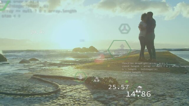 Couple hugging jetty at sunset environmental data starting and moving around couple showing CO or CO