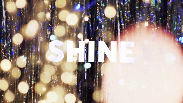 Prism strip sweeping, starting bold SHINE letters revealing leftward, tinsel sparkling celebrating