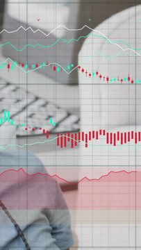 Vertical video: Teen donning headset as camera pulling back revealing market chart, seeking insight