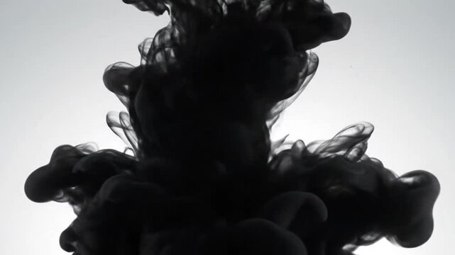 Black ink cloud in liquid emphasizing modern aesthetics and minimalist design