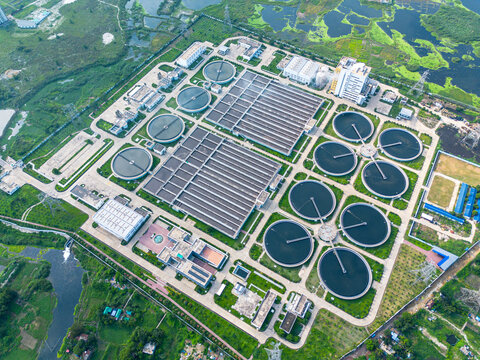 Aerial view of Sewage Treatment Plant, Dhaka WASA with circular clarifiers and rectangular aeration tanks surrounded by greenery in Dhaka, Dhaka Division, Bangladesh.