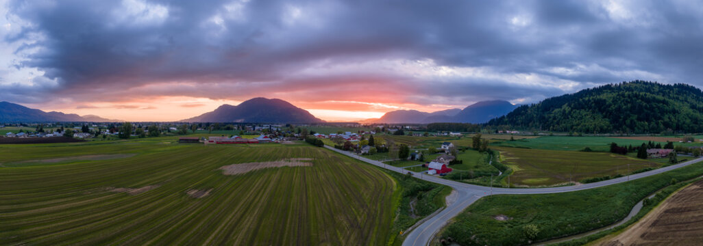 Sunset Over Farmland and Mountains in Chilliwack Fraser Valley, British Columbia, Canada Panorama