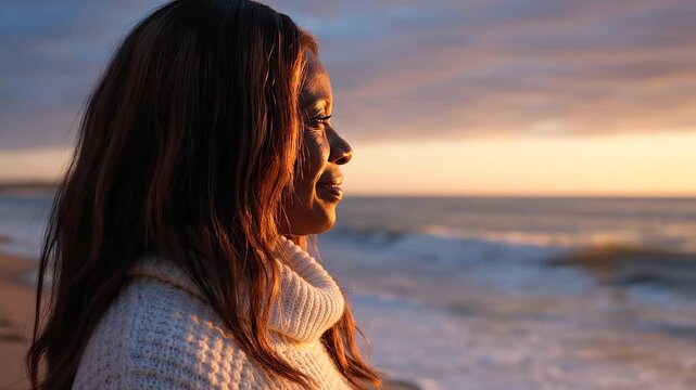 Woman at beach during sunset emphasizing natural beauty and pristine environments