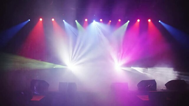 Dynamic Stage Lighting Show- Vibrant Laser Beams Dance Through Fog- Concert Performance Atmosphere