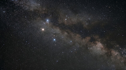 Fototapeta premium Spectacular View of the Milky Way Galaxy with Bright Stars and Cosmic Dust in the Deep Night Sky