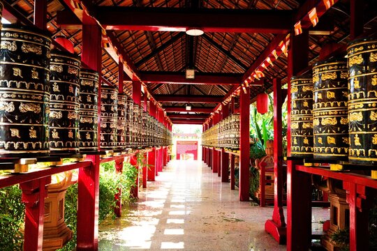 Prayer wheel corridor perspective Buu Minh Pagoda Vietnam