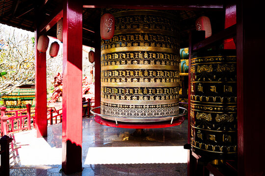 Ornate golden prayer wheel detail Buu Minh Pagoda Pleiku Vietnam