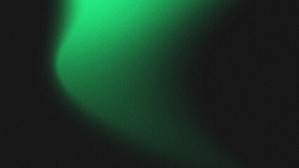 Fototapeta premium Abstract grainy green gradient background with soft light effect on black backdrop.