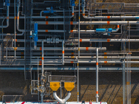 Aerial view of the complex network of industrial pipes and valves at the UGS Damborice facility in Damborice, South Moravian Region, Czechia.