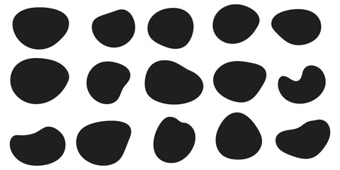 Fototapeta premium Organic black blob silhouettes and abstract liquid shapes featuring diverse hand-drawn pebble forms and smooth fluid elements for modern graphic design layouts and patterns.