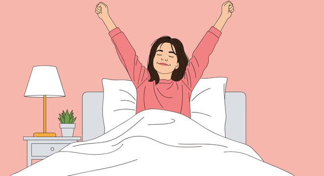 Energetic young woman wakes up in her comfortable bed and stretches her arms wide with a happy smile to start a brand new morning.