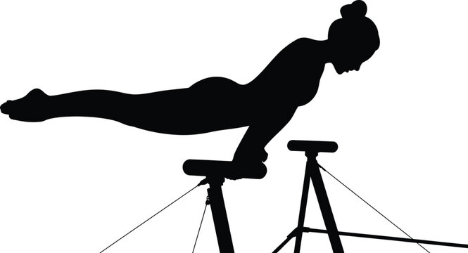 Silhouette of female gymnast balancing on parallel bars