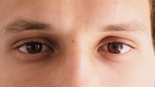 Eyes, optometry and face of man with vision, eyesight or optical health for glaucoma test. Ophthalmology, wellness and portrait of male person with eyecare, retina or laser treatment results.