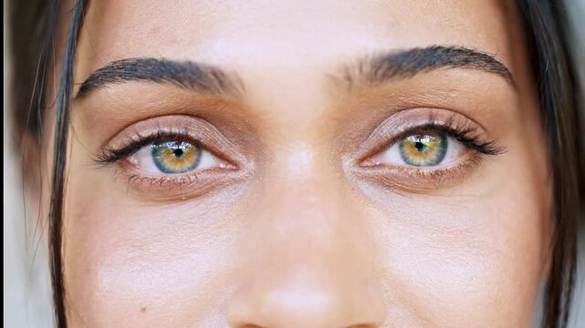 Extreme Close Up View Of Makeup And Eye Texture Of An Attractive Female Model. Abstract Beauty Shot Of Upper Face. High Quality 4K Slow Motion Video Perfect For Mascara And Eyebrow Commercials