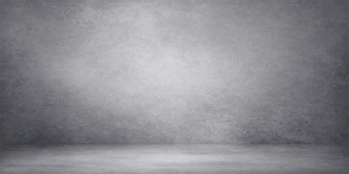 Empty dark interior room with a textured gray concrete wall and floor featuring a rough vintage grunge cement pattern for a blank stone backdrop