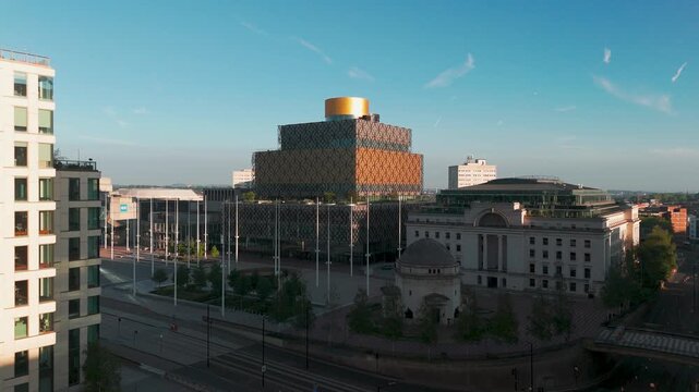 Aerial drone view of Library of Birmingham and Centenary Square at sunrise