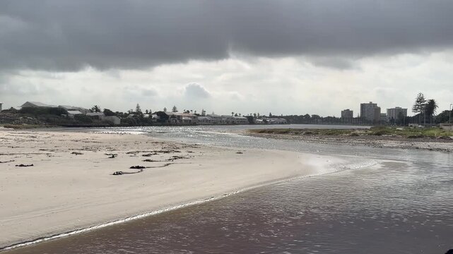 A deserted beach on a stormy winters day on the Atlantic Ocean.
