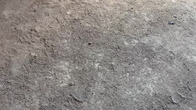Unfinished raw concrete floor texture background