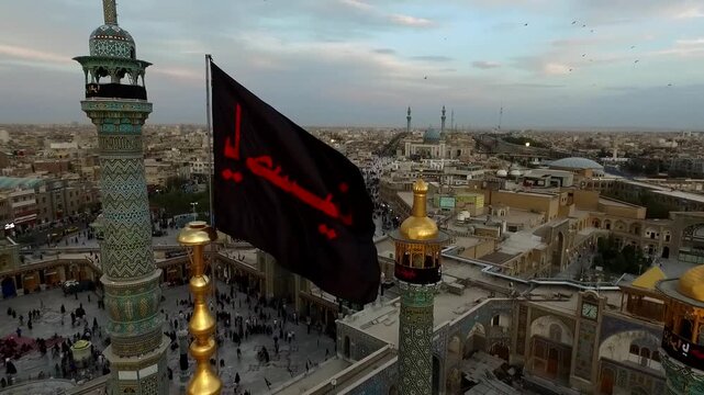 Final aerial perspective reveals entire Lady Masoumeh shrine with golden dome minarets and pilgrims at golden hour in Qom Iran cinematic stock video production.