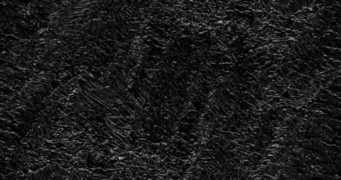 Black Paint smear and mix. Stop-motion animation quick successive. 