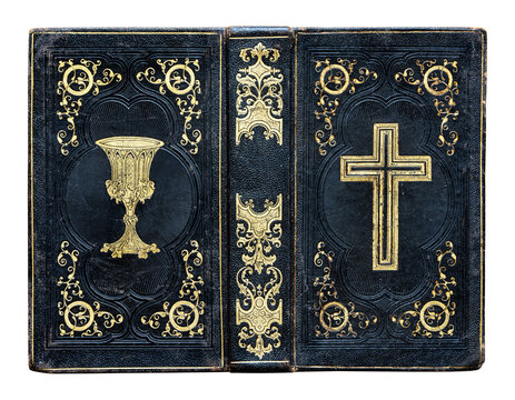 Antique black leather Bible with richly embossed cover and elegant gold detailing, isolated on a white background.  Ideal for themes of Christianity, religion, spirituality, faith, history.