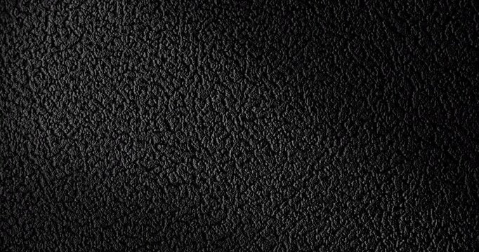 Shadowy Rough Texture Glide with Gentle Motion. Video featuring a dark, rugged surface with a slow, smooth drift, perfect for raw and minimalist visuals.