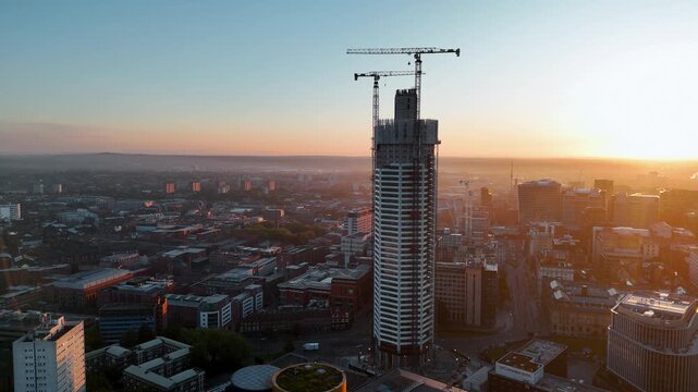 Octagon Tower Construction Site Aerial Orbit at Sunrise, Birmingham, UK