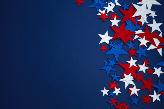 Red white and blue stars on navy background