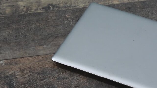 Finish working on your laptop as you close it and set aside your headphones
