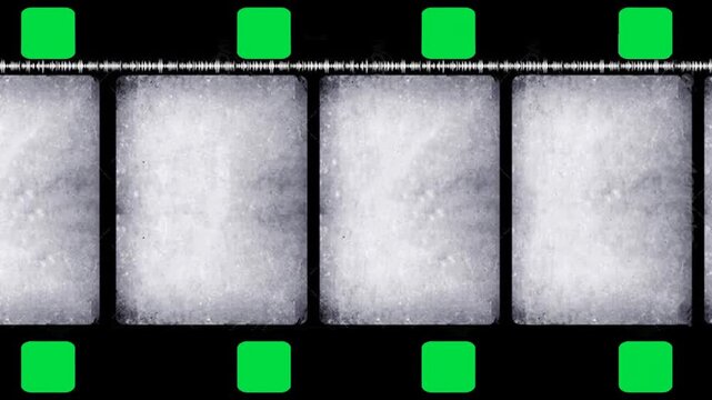 Black White Empty negative film strip on green screen chroma key background. monochrome classic roll style stock footage for cinematic video editing and creative media projects. portfolio template
