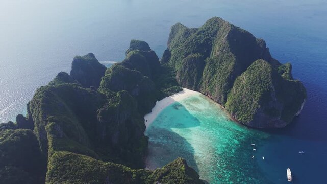 Maya Bay located on Koh Phi Phi Leh. Aerial dolly out