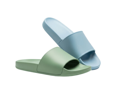 Pair of light blue and green rubber slides isolated on transparent background