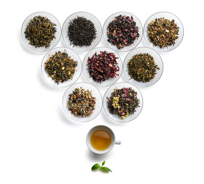 Large assortment of tea on a white background. The view from the top