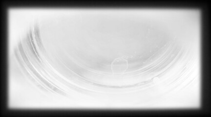 Obraz premium Black grunge frame with transparent film texture overlay isolated on PNG background.