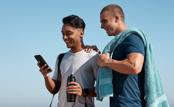 Happy men, fitness and break with phone for social media, network or tracking performance. Active, male people or rest with smile on smartphone for health tips, online advice or guide in nature