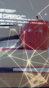 Vertical video: Camera panning right, books pencils apple entering as overlay growing to show code