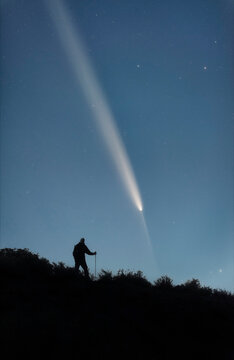 Man Silhouette on Mountain Watching Interstellar Comet C/2023 A3