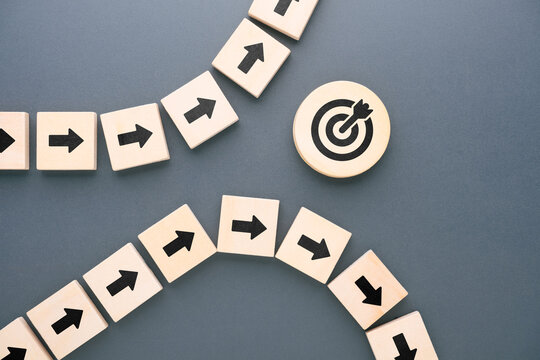 Arrow path changing direction away from target symbol, representing strategic misalignment, communication failure, inaccurate execution, and business plans that fail to achieve intended goals