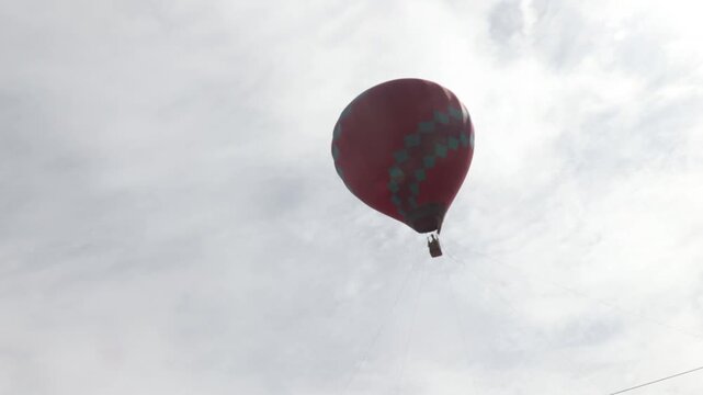 Raw video footage of a colorful hot air balloon flying near Atal Tunnel in Himachal Pradesh India showcasing mountain tourism adventure and scenic landscape.