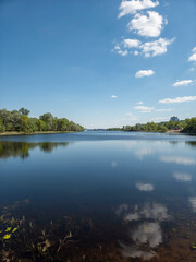 Obraz premium River Lake Summer Blue Sky Calm Water Reflection Nature Green Trees Tranquil