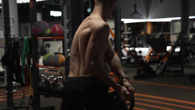 Shoulder exercise. Workout training. Athletic man performing landmine exercises with barbell. Strength and fitness. Muscular sportsman in sport gym do landmine exercise. Sport sportsman, 4k