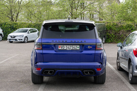 Nancy, France - April 10th 2026 : View on a blue Land Rover Range Rover Sport SVR parked on a parking lot with cars around.