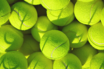 Fototapeta premium Background, sport and tennis with balls for competition, game or tournament as wallpaper. Equipment, fitness and pile with supplies closeup for match practice, skills development or training session