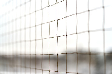 Fototapeta premium Strong knotted barrier net for balcony protection