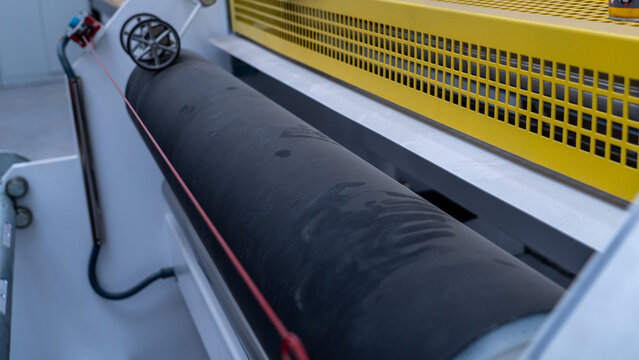 Industrial heavy-duty roller shaft with safety guard and sensors