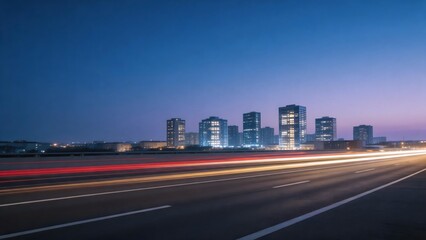 Fototapeta premium City skyline at dusk with light trails